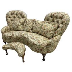 Victorian design hardwood-framed double back settee, upholstered in buttoned floral pattern fabric, curved back over serpentine seat, on cabriole feet, with matching scatter cushions (W182cm, H94cm, D86cm); together with crescent-shaped footstool with cabriole feet (W55cm)
