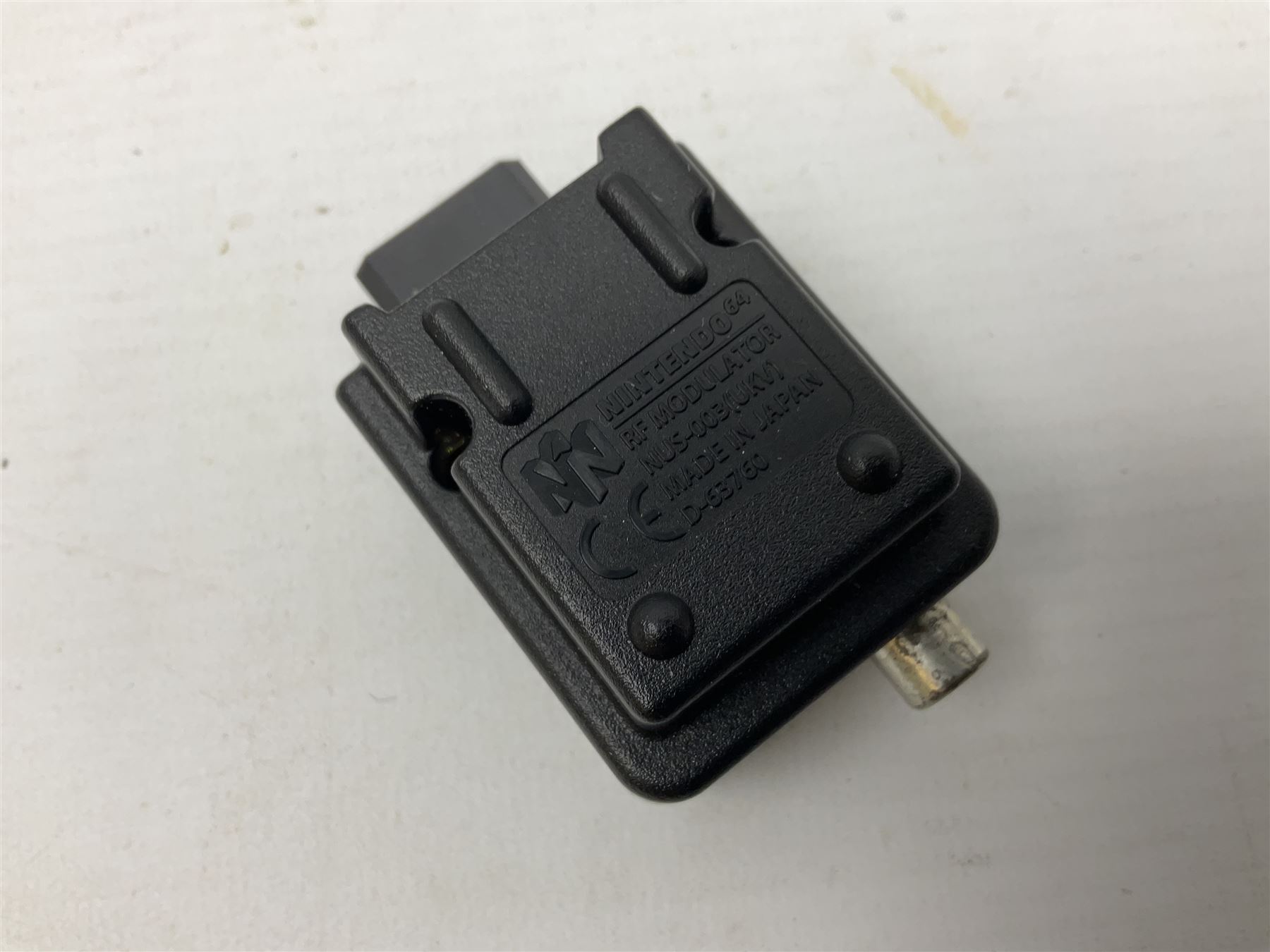 Nintendo 64 console, two controllers, games and accessories. Accessories to include the ‘Tremorpak’ and ‘Spook’ 2 Phono plugs and a S-VHS plug with adapter, both in original boxes. Games to include ‘Golden Eye 007’, ‘Doom 64’, ‘Killer Instinct Gold’, ‘Tetrisphere’, ‘F-1 World Grand Prix’, ‘Pilotwings 64’ and ‘Lylatwars’ with ‘Rumble Pak’, all with original boxes and instruction manuals. ‘Star Wars Episode I Racer’ game cartridge in Shadows of the Empire box. 