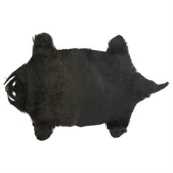 Two early 20th century Japanese 'Musha-ningyo' or Warrior Doll figures, costumed with distinctive armour and attributes, the first seated on lacquered red stool the other on a taxidermy rug, seated figure H44cm (2)