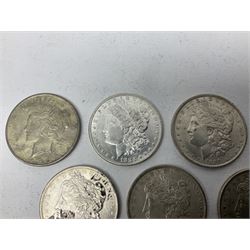 Eight United States of America silver Morgan dollar coins, dated 1882, 1884 O, 1884, 1885, two 1886, 1889, 1890 and a 1925 peace dollar
