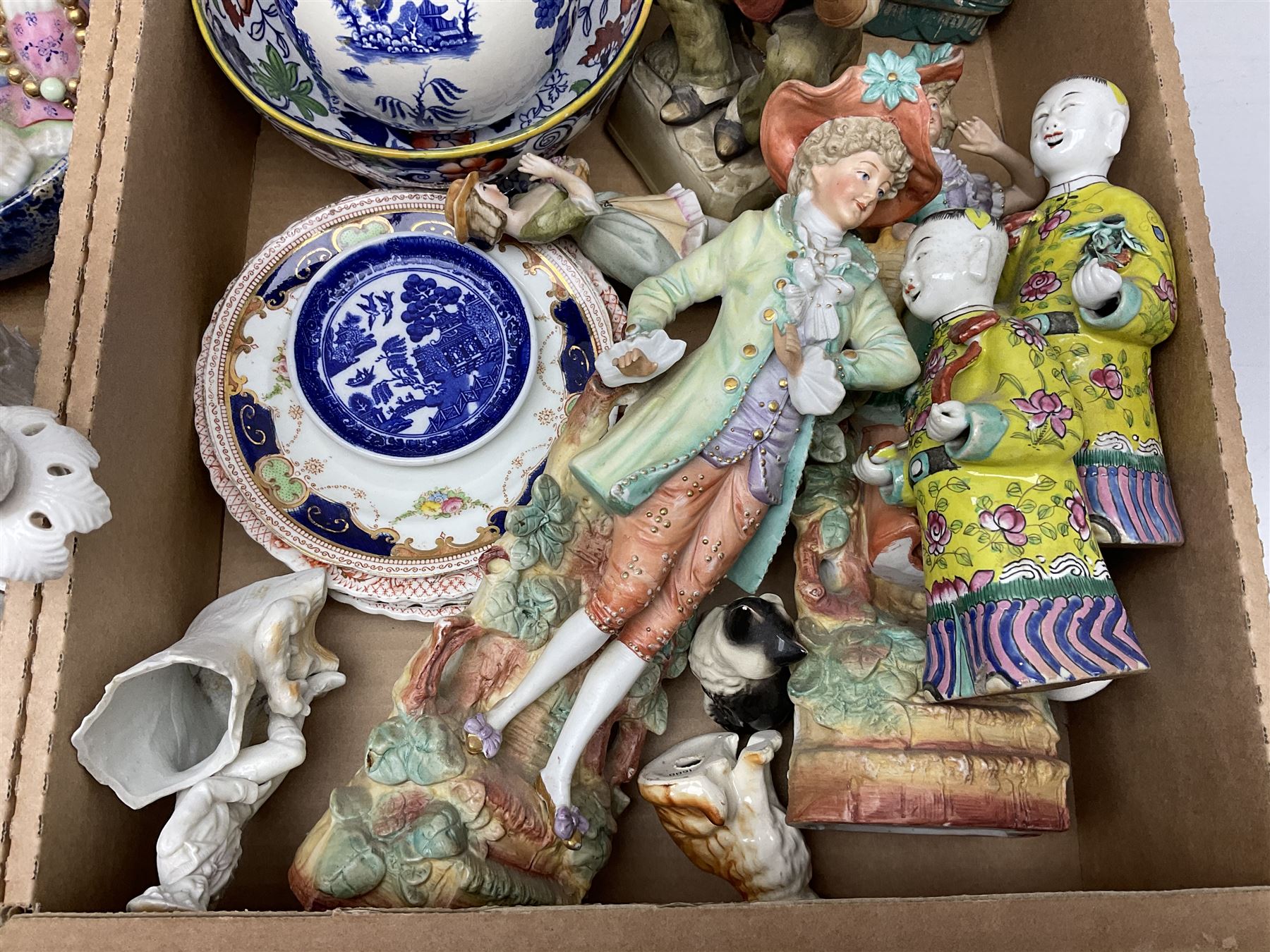Collection of ceramics to include Royal Doulton Winston Churchill toby jug, Capodimonte style figures, novelty brandy decanter etc, in two boxes