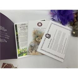 Five Charlie Bears Plush Hug Book Collection books, comprising Guide To Snuggleability containing Snuggleability CB191971F, Paw-Some Facts Directory containing Pawsome CB191971D, Bear Therapy Handbook containing Bear Therapy CB191971E, Study Buddy Handbook containing Study Buddy CB191971A, and Guide to Being Bear-illiant CB191971B, each designed by Isabelle Lee, each with tags, plus Charlie Bears Secret Hug Book (lacking contents), together with assorted Charlie Bear accessories, to include two Bear Ears Duffle headbands CBBEARSDUF, Egg Cup CB185198 , Incy Wincy CB205252AO, with tag, four key rings, all with tags, Bear Care Kit and contents, recipe cards, pin badges, tape measure, notebook, etc., (Qty)