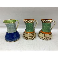 Seven Myott Son & Co hand painted jugs, all with printed mark beneath, H21cm