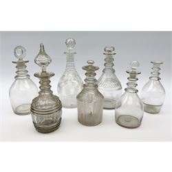 A group of seven various 18th/early 19th century glass decanters, examples with ring necks and slice cut decoration, largest H22cm, (stoppers un-associated). 
