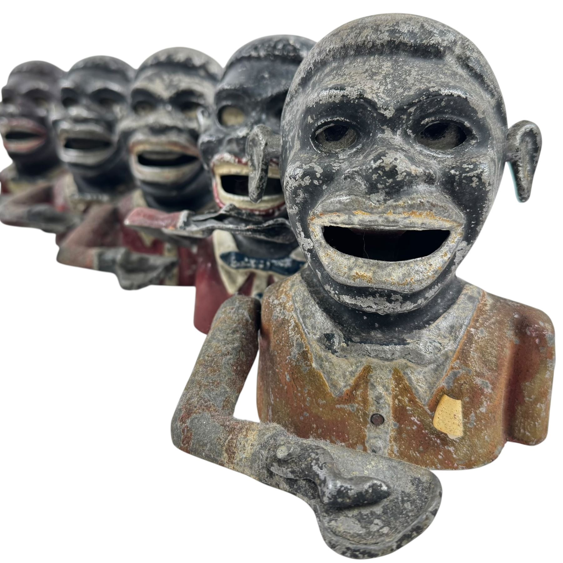 Collection of cast iron Jolly money boxes 