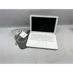 2009 Macbook with charger and second skin case