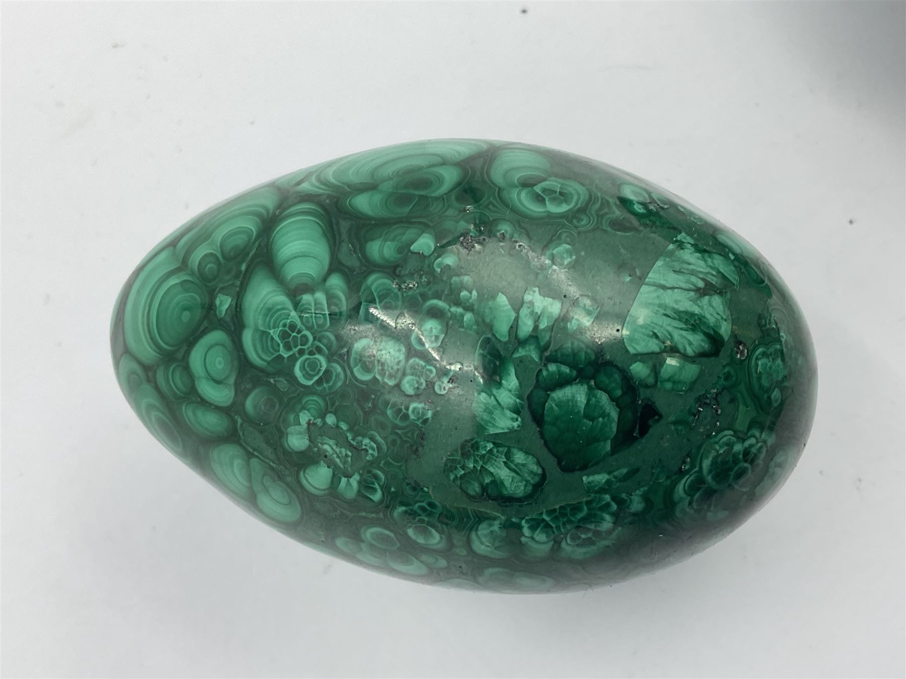 Three malicate specimen eggs, originally part of the collection of the late Stanley J Seeger, largest H7cm