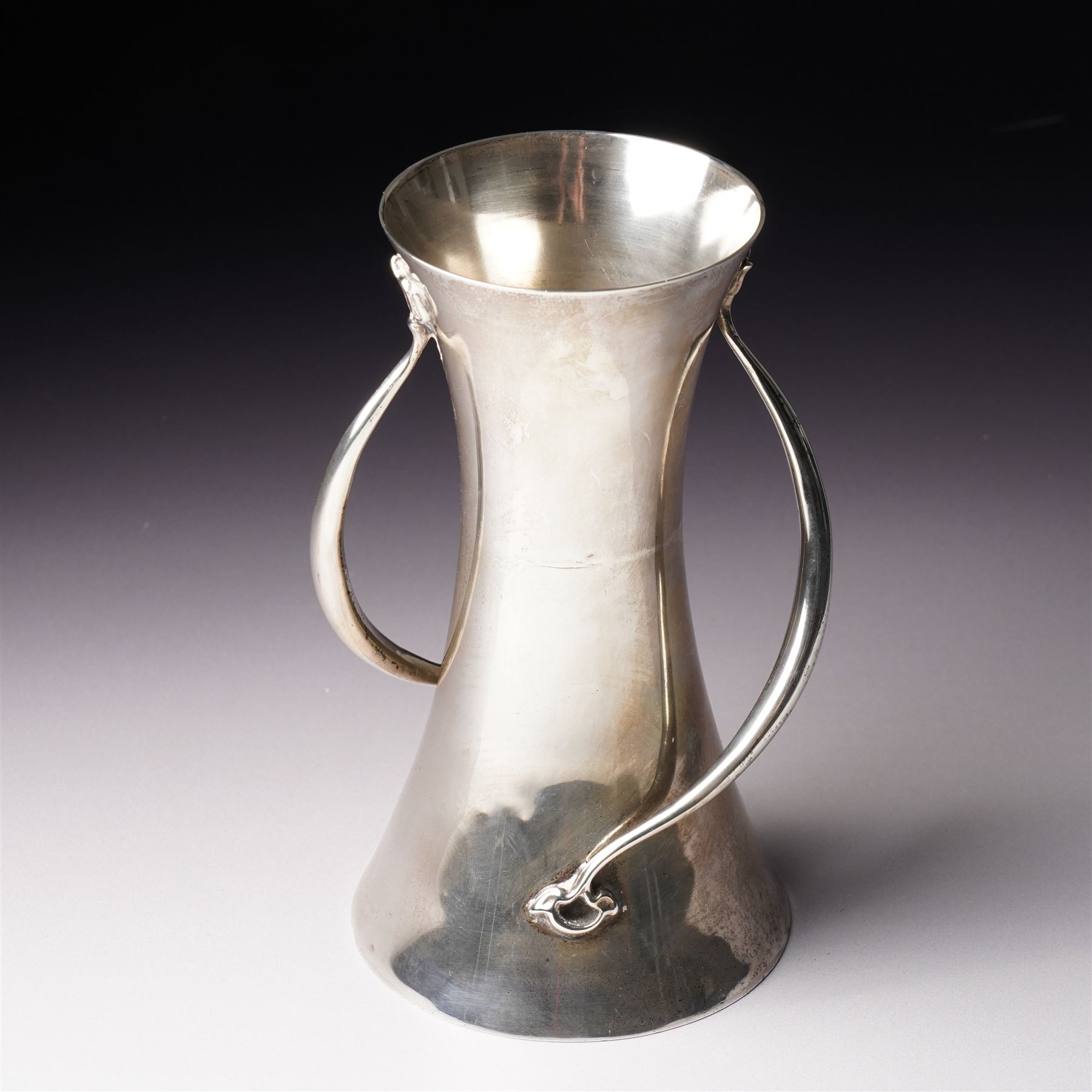 Early 20th century Art Nouveau silver vase of waisted form with trailing handles H15cm Birmingham 1904 Maker  Edward Souter Barnsley retailed by Finnigans