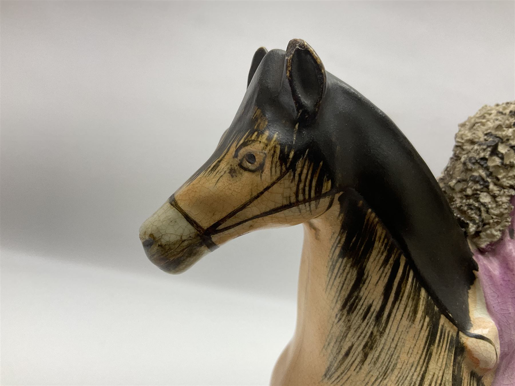 19th century Staffordshire figure of Robert Peel, titled 'Sir Robert Peel', modelled on horseback, atop an oval plinth base featuring a naturalistic and floral design, H30cm 