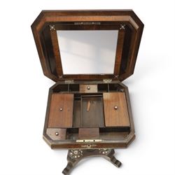 Victorian mahogany and mother-of-pearl inlaid work table, the octagonal hinged top enclosing a mirror and fitted compartmented interior, raised on a carved pedestal and quatriform platform base with scrolled feet