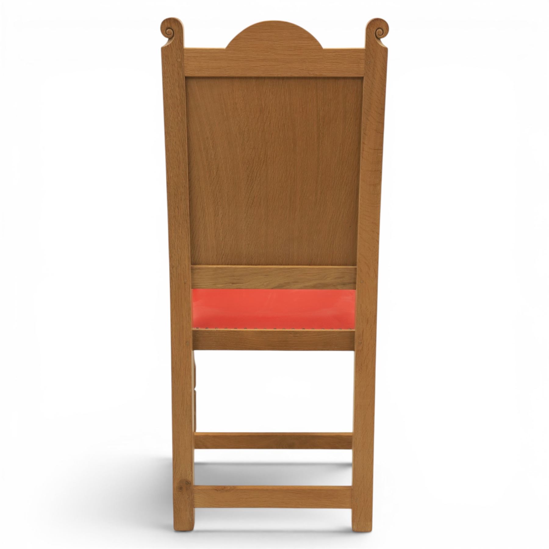 Mouseman - oak armchair high back with fleur de lis motif, red leather padded seat with brass studded trim, with carved mouse signature, by the workshop of Robert Thompson of Kilburn