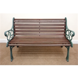  Cast iron and wood slatted rectangular garden table (W141cm, H66cm, D68cm) a matching two seat bench (W130cm) and pair armchairs (W63cm) (MAO030320)  