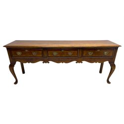 Georgian design oak dresser base, moulded rectangular top over three drawers with moulded fronts and mahogany bandings, shaped apron on cabriole front supports