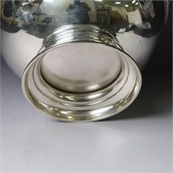 Edwardian silver Monteith punch bowl, the scalloped rim with strapwork and figural decoration, with two lion mask mounted ring handles, upon a circular stepped foot, hallmarked London 1903, maker's mark worn and indistinct, H15cm, D23cm