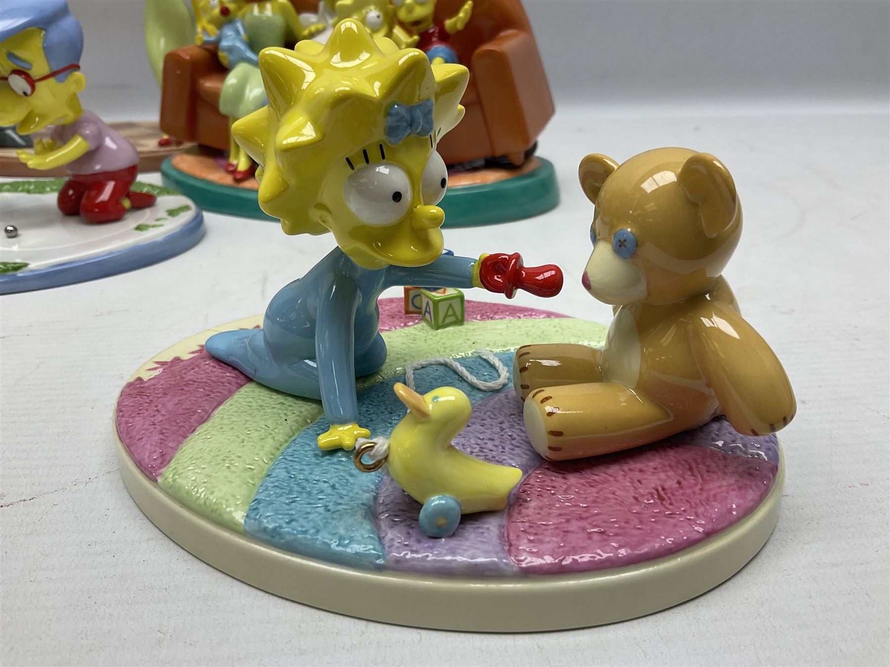 Six Coalport The Simpsons character figures, comprising limited edition 'The Family That Sits Together Fits Together' annual 2005, TS01 Two to Tango, The Gift of Maggie, Will Work For Duff, Yellow Girl Blues and Losing His Marbles, all boxed