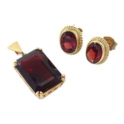 14ct gold emerald cut garnet pendant, stamped, and a pair of 9ct gold oval cut stud earrings
