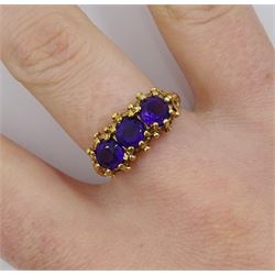 9ct gold three stone amethyst ring with scroll design gallery, London 1980