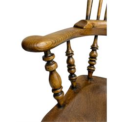 Early 19th century elm and ash Yorkshire Windsor armchair, high stick back with pierced and fretwork splat, turned supports joined by double H-stretcher