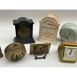 Miniature 'Zenith' travel alarm clock, in engine turned brass case with silvered numerical chapter ring, H5cm, together with other clocks to include Aynsley Portland Ware mantel clock, with moulded peacock design, Europa travelling clock, brass carriage clock, German copper clock of cube form etc