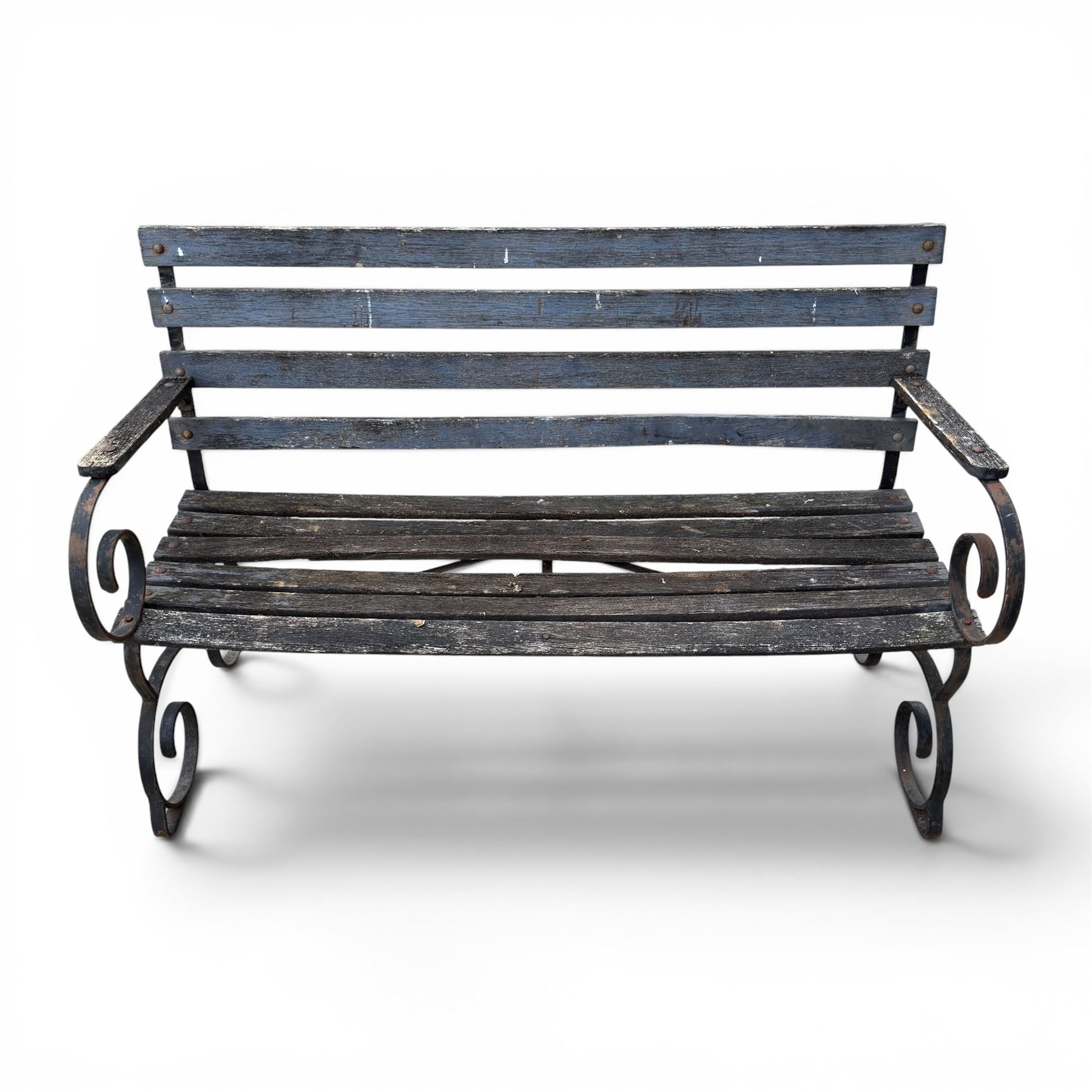 19th century wrought iron strapwork and slatted wood garden bench, the arm terminals and end supports of scrolling form