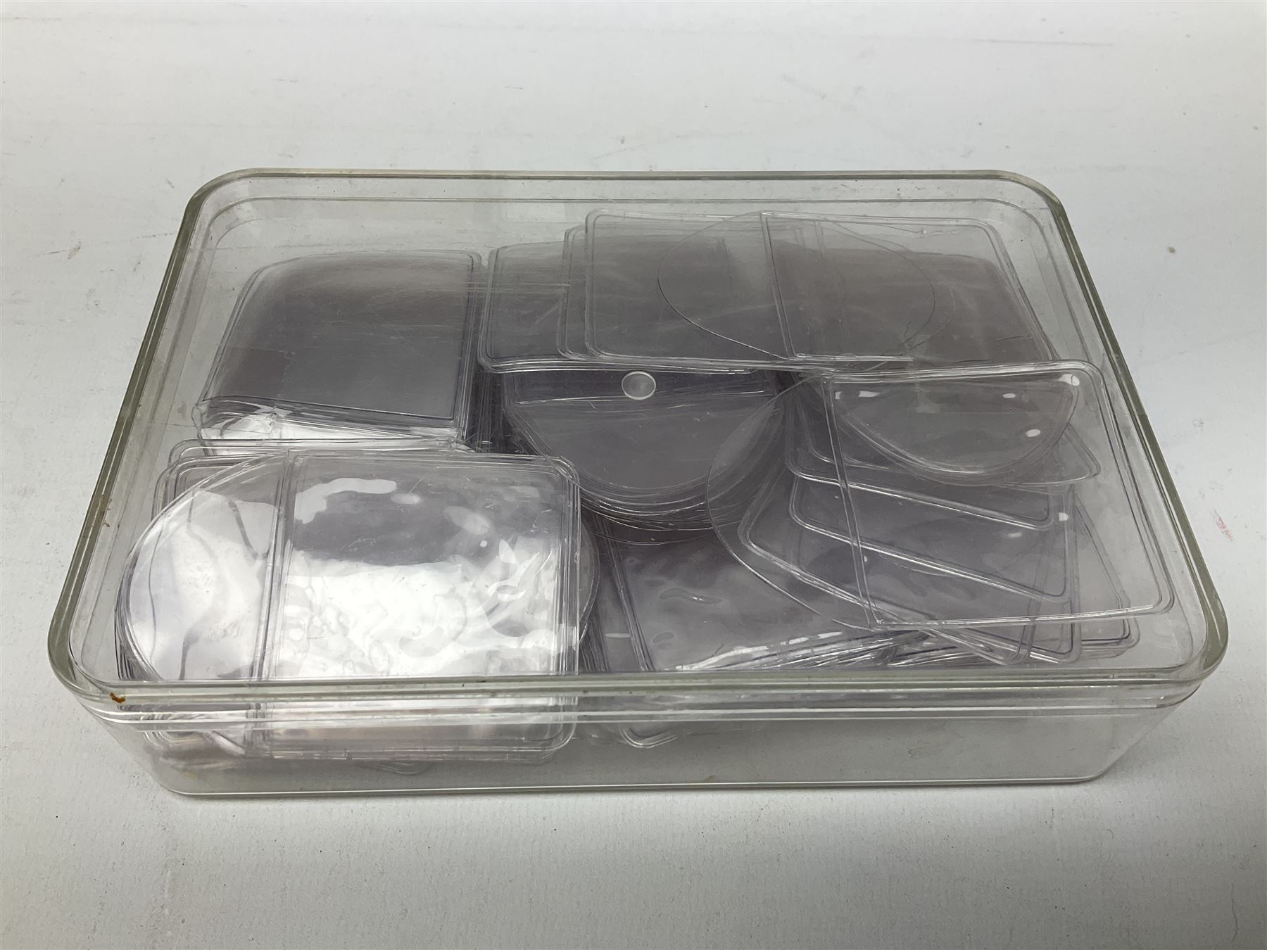 Empty coin boxes, three to house ten half sovereigns each, four to ...