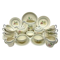 Susie Cooper Nosegay pattern tea service, teapot, eight cups and saucers, six dessert plates, three graduating jugs, covered twin handled sucrier, open sucrier  and cake plate 