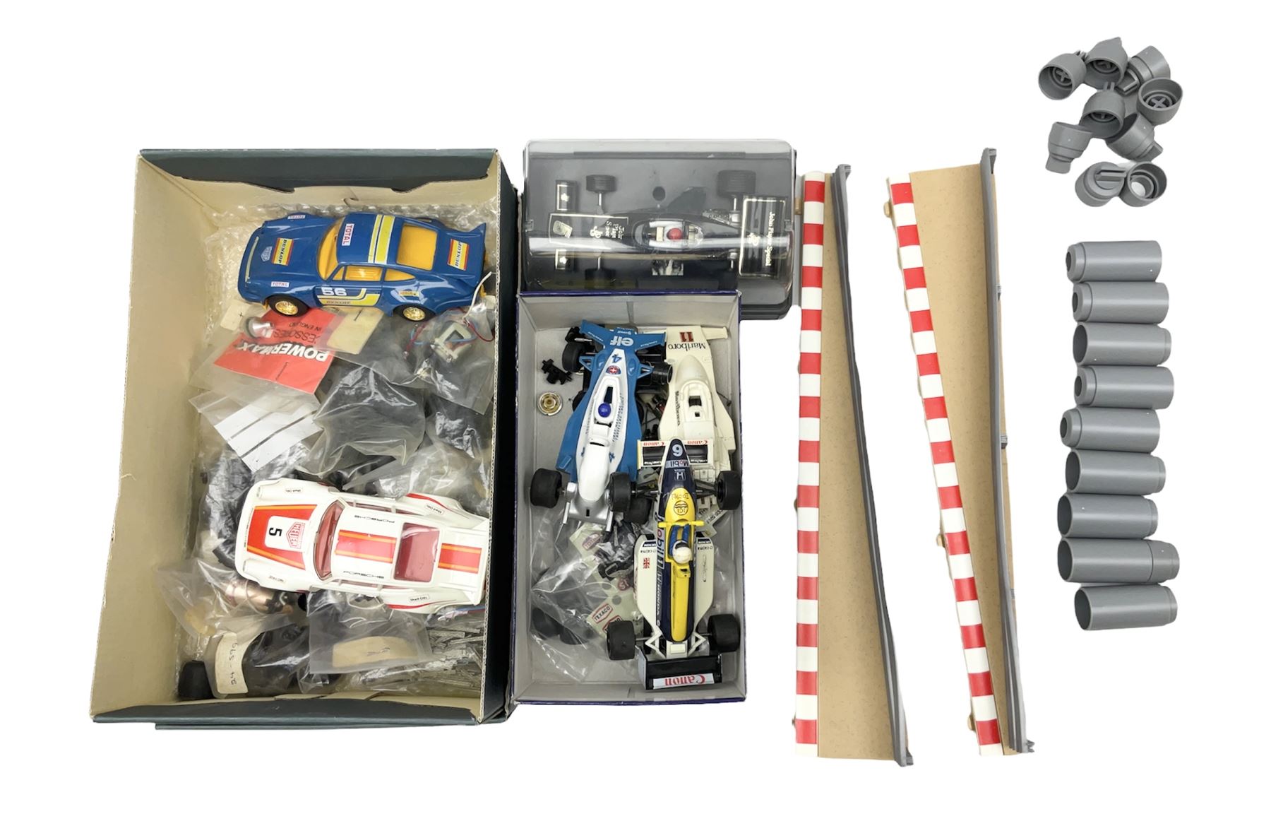 Scalextric - John Player Special racing car; boxed; two C125 Porsche cars; C135 Tyrrell 008 racing car; Honda racing car; all unboxed; quantity of unused and used spare parts including motors, wheels and other accessories etc