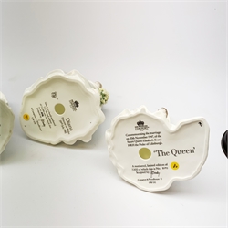A group of four limited edition Coalport figurines, comprising Diana Princess of Wales, 5114/12500, with accompanying certificate, The Queen, 3979/7500, with accompanying certificate, Princess Alexandra, 2912/7500, and Queen Mary, 2583/7500. 