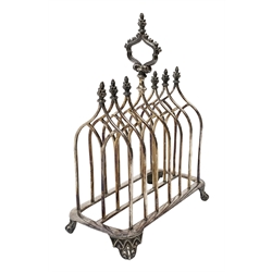 Victorian electroplate Gothic style toast rack, with seven arched bars, openwork handle and arcaded bracket feet, marks for John Gilbert, H25cm   