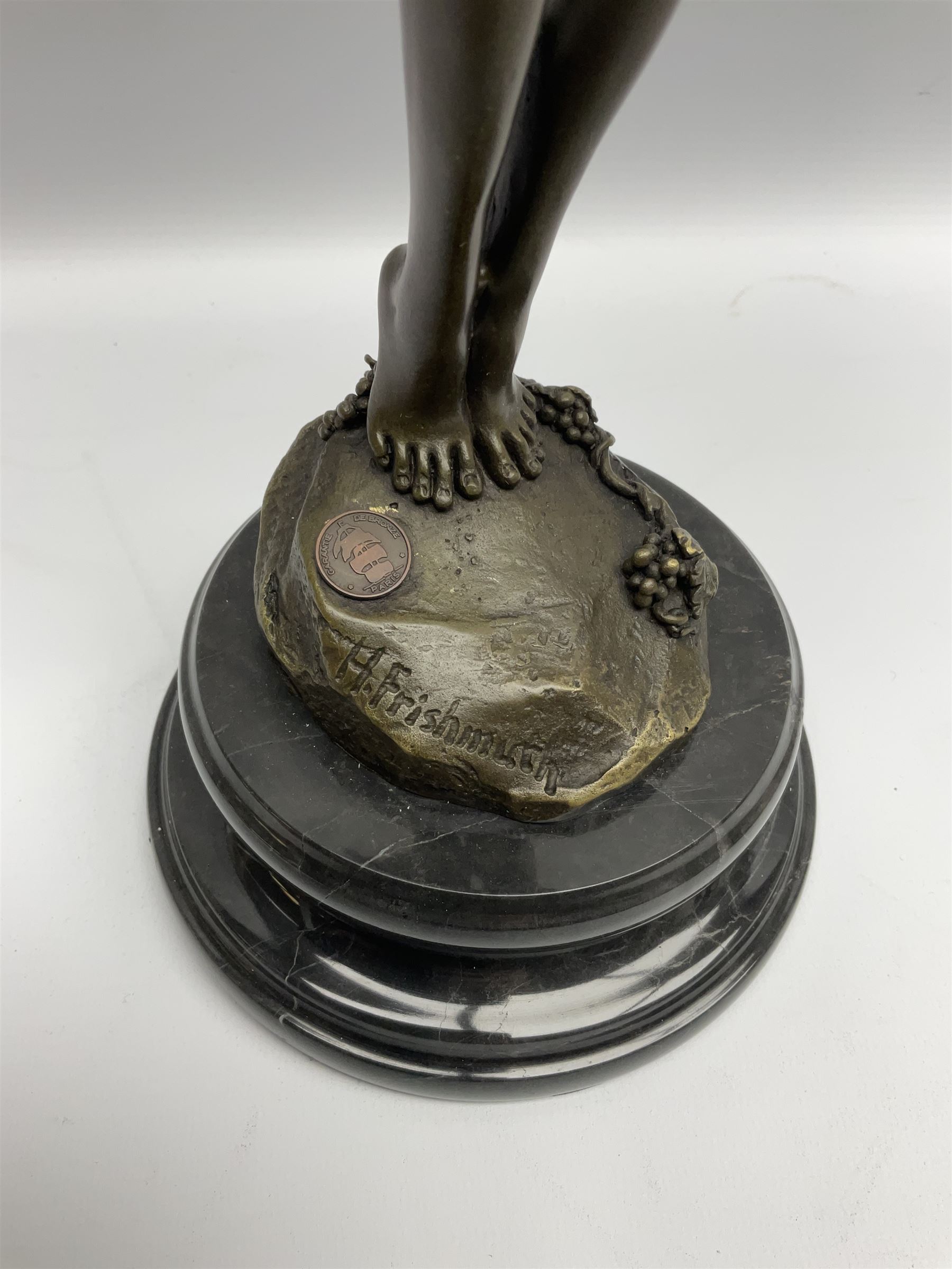 Bronze figure of a nude female holding a vine, after 'H. Frishmuth', with foundry mark on socle base, H38cm