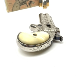 Factory engraved Remington .41 calibre double barrel over and under Derringer, the top of the barrels inscribed 'E. Remington & Sons Ilion. N.Y. Elliot's Patent Dec 12th 1865', with mother-of-pearl split grip, serial no.2695, L13cm overall; with receipt of purchase from Pete Holder dated 08/06/2008; reputedly from the Raymond Kendal collection (former Director of Interpol); with box of  dummy cartridges