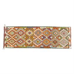Chobi flatweave kilim runner with a repeating stepped diamond medallion design in live gre...