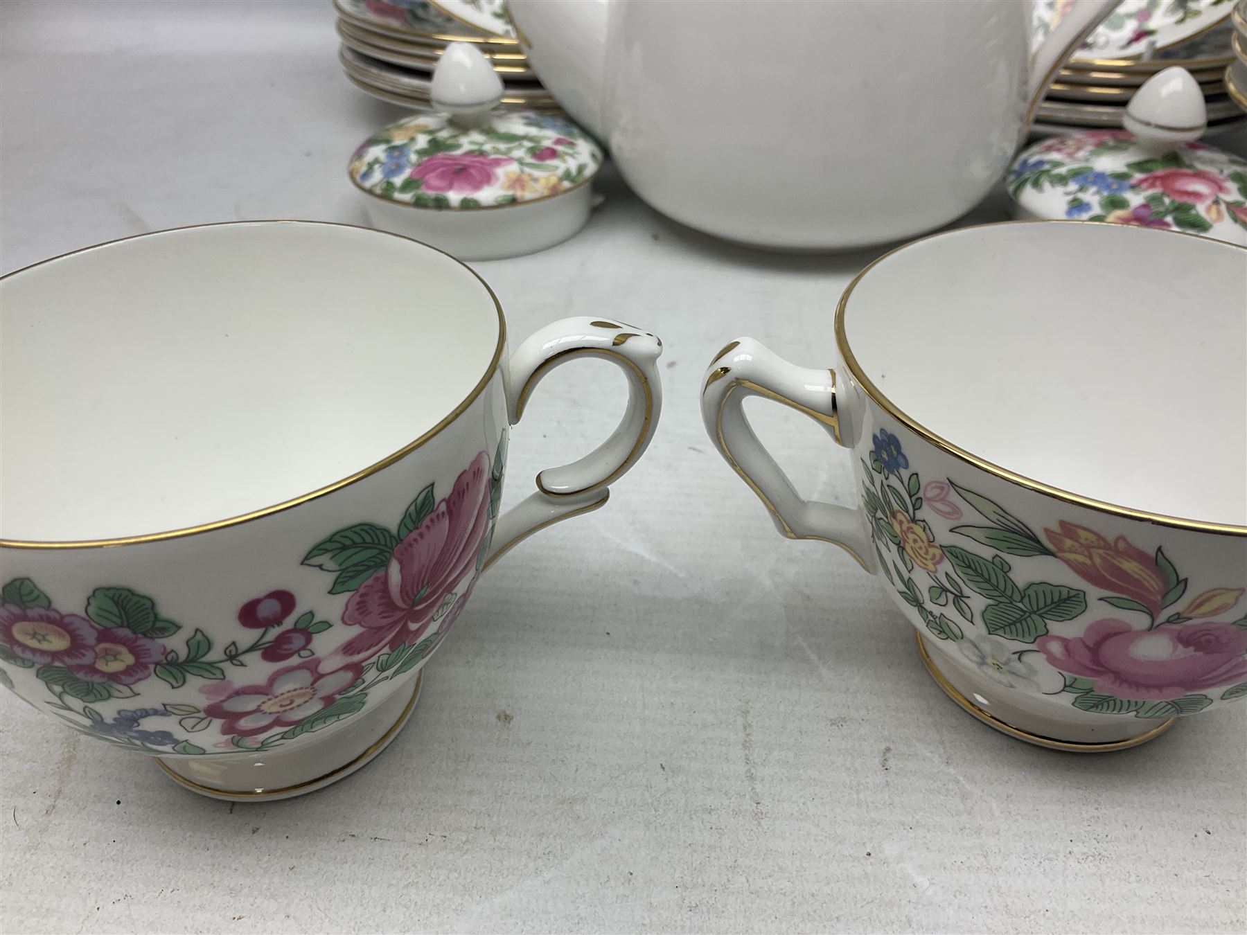 Crown Staffordshire Thousand Flowers pattern part tea service, to include teapot, two open sucriers, eighteen cups, fifteen saucers etc (57)