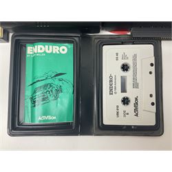 Sinclair ZX Spectrum (1984) with accessories and games; ten games for Sinclair Spectrum and 48K Spectrum to include ‘Knight Lore’, ‘The Way of the Exploding Fist’, and ‘Green Beret’ all in original boxes, ‘Rambo First Blood Part II’ without original box; Sinclair UK1400 Power Supply Unit, Hales Universal Mains Adapter, RAM Turbo Spectrum Joystick Interface, Starlite Cassette Player, all without boxes