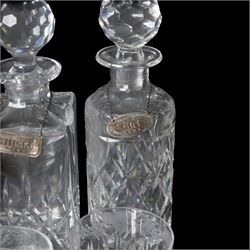 Four glass decanters with three silver labels for gin sherry and whisky, hallmarked Birmingham 1984, together with two Stuart Crystal vases and set of four Galloway glasses