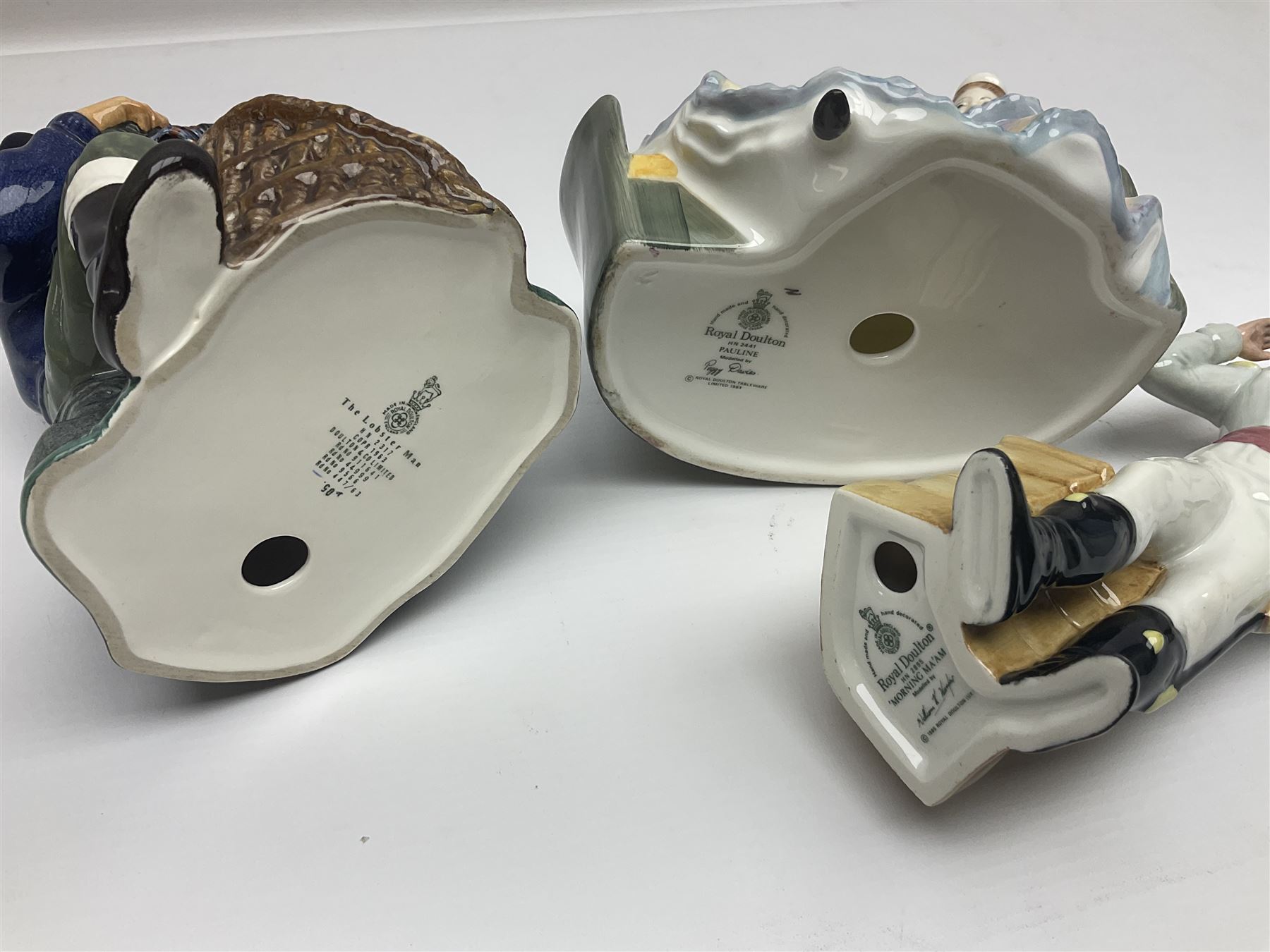 Three Royal Doulton figures, comprising The Lobster Man HN2317, Morning Ma'am HN 2895 and Pauline HN2441