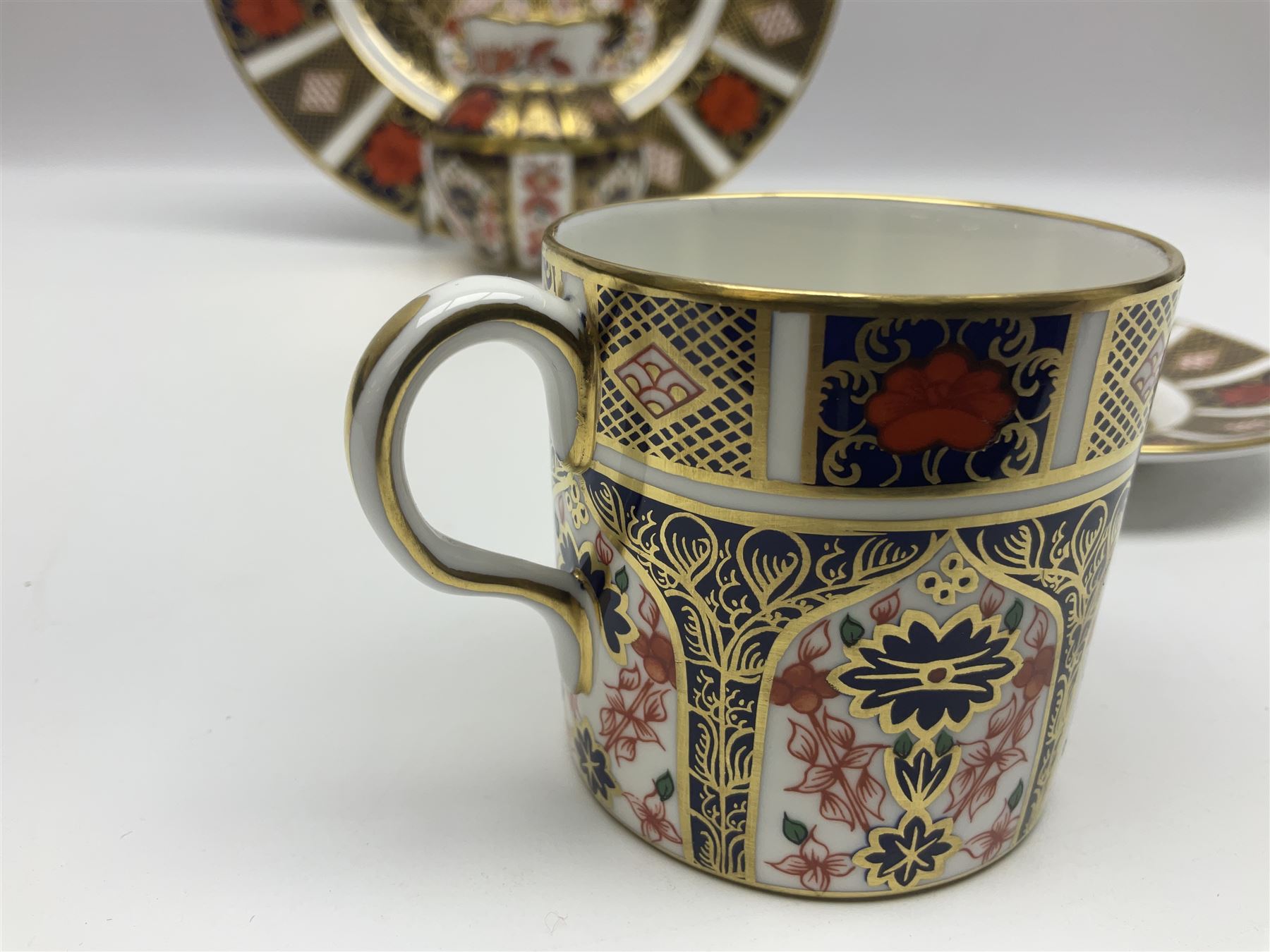 Royal Crown Derby Old Imari pattern miniature vase, coffee can and saucer, teacup and saucer and plate, all with printed mark beneath, vase H8cm 