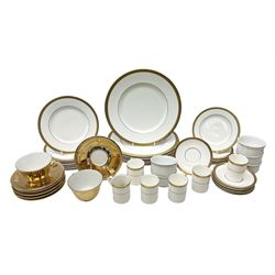Royal Doulton Royal Gold pattern coffee and dinner wares comprising six coffee cans and saucers, eight dinner plates, seven side plates, six dessert plates, and Royal Worcester Gold Lustre tea wares