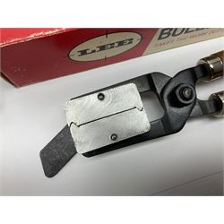 Three modern bullet moulds comprising Lee double cavity .44 calibre, boxed with instructions; and two Lyman .38 calibre; all in unrelated 19th century mahogany box