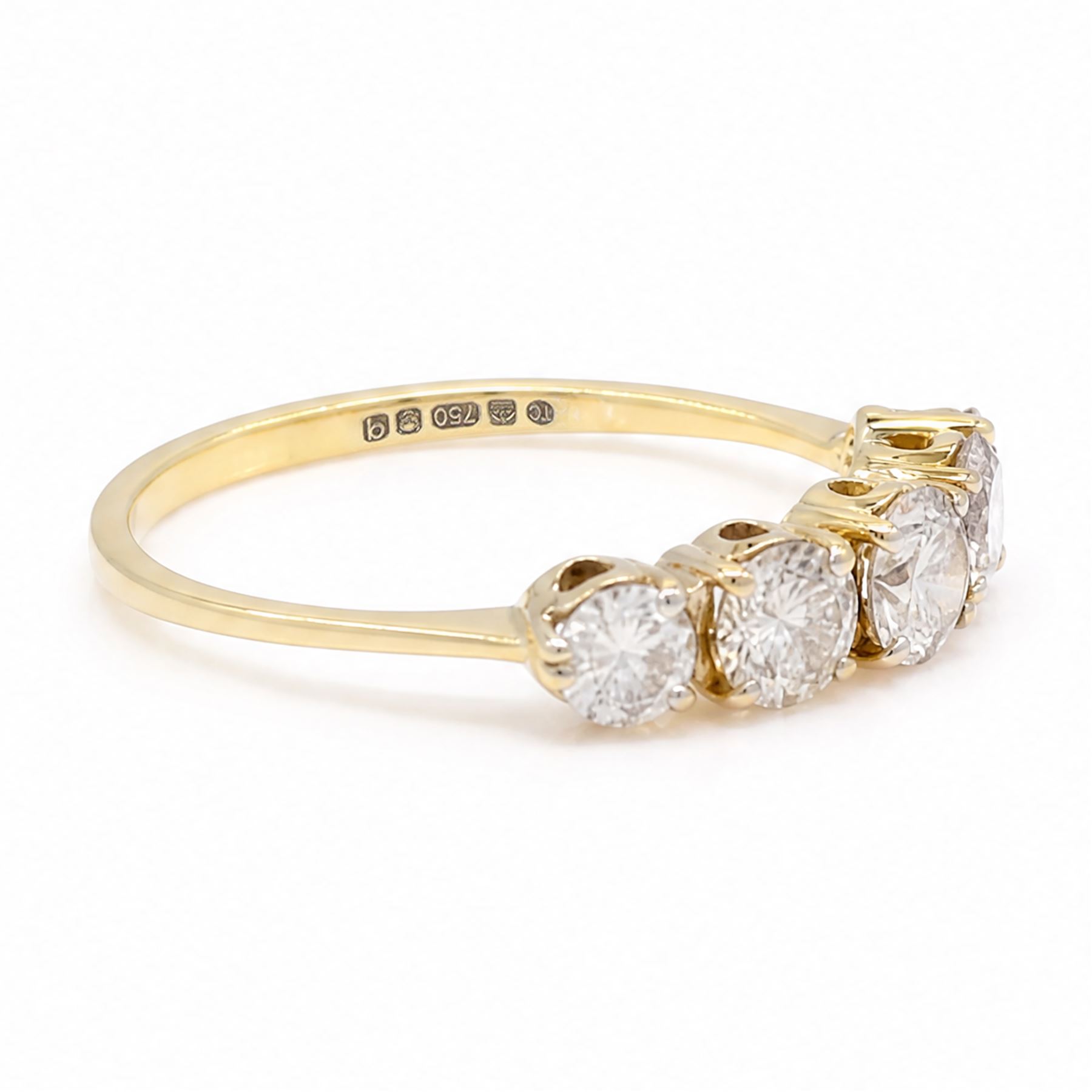 18ct gold diamond ring, set with five graduating round brilliant cut diamonds, London 2015, total diamond weight 1.21 carat