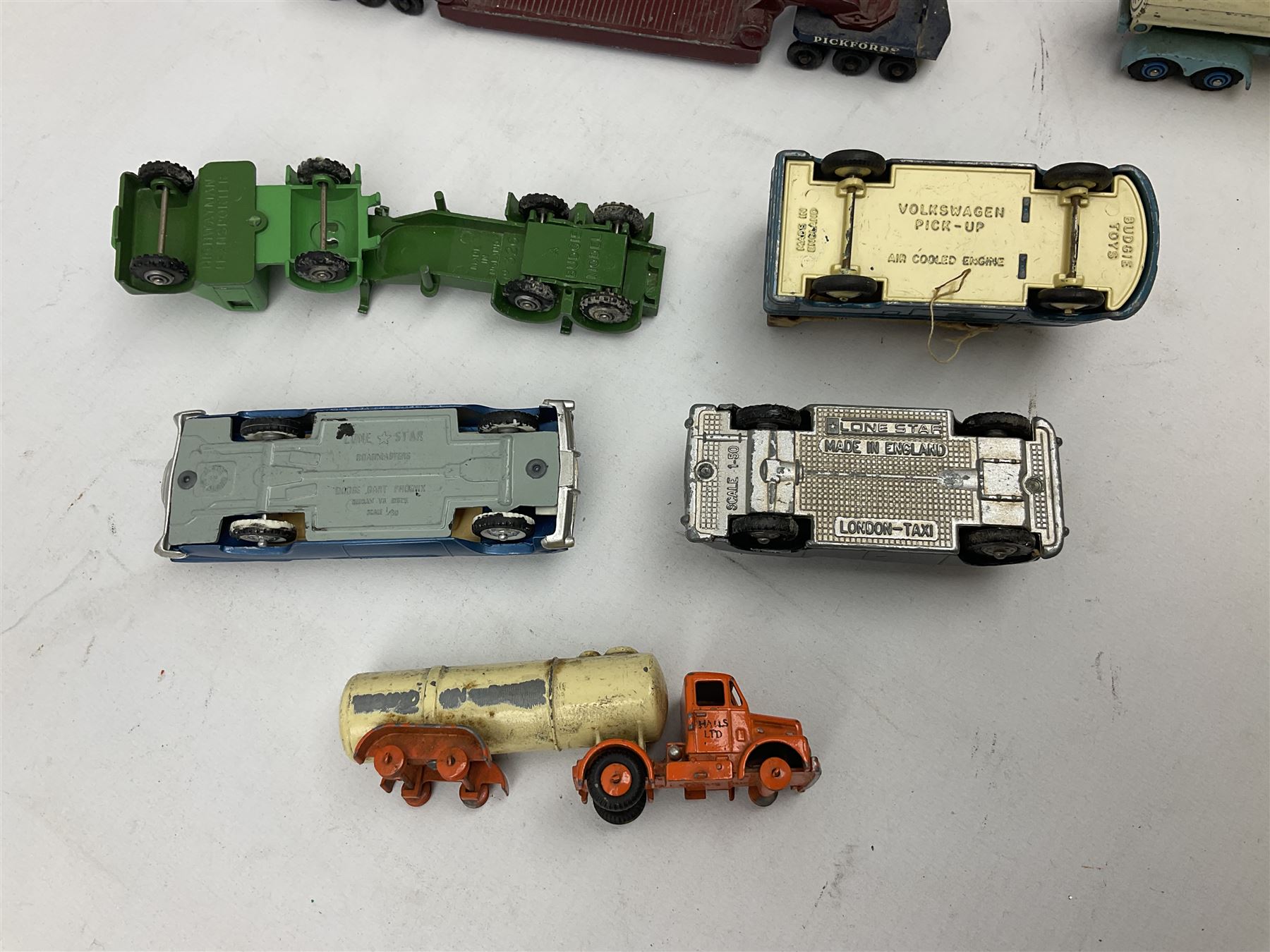 Budgie - five unboxed and playworn die-cast commercial vehicles comprising Scammell Scarab with BR Semi-Trailer, Volkswagen Pick-Up, Towing Tender & Breakdown Truck, Highwayman Transporter No.326 and Routeman Pneumajector No.322; Morestone G&E Wood open lorry and Petrol Tanker; nine early Lesney models; and small quantity of others by various makers