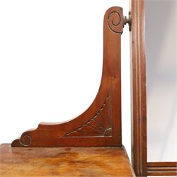 Late Victorian figured walnut and mahogany dressing table, raised swing-mirror back over trinket drawers, fitted with two drawers with brass Aesthetic Movement handles, on ring-turned supports with ceramic castors