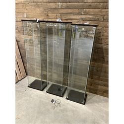 Three Ikea rosewood finish illuminated four glass shop display cabinets, with shelves and keys