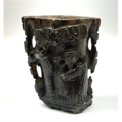 Chinese carved stone libation cup, depicting a man under a canopy H10cm. 