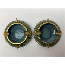 20th century Chinese cloisonne enamel smoking set, comprising two ashtrays, box and tray, with floral and foliate scrolling on green ground