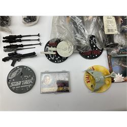 Quantity of Star Trek memorabilia and promotional merchandise including action figures, calendars, mobile kit, collector's fact cards, models etc; many in original packaging