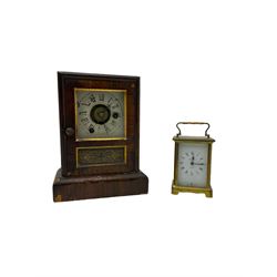 A French carriage clock by Duverdrey & Bloquel c1920, with three glass panels and white enamel dial, Roman numerals and minute markers, lever platform escapement and integral winding key. Together with a late 19th century American spring driven 30hr alarm clock by Seth Thomas of Connecticut USA c1890, in a wooden case with a white dial and brass alarm setting disc.   


