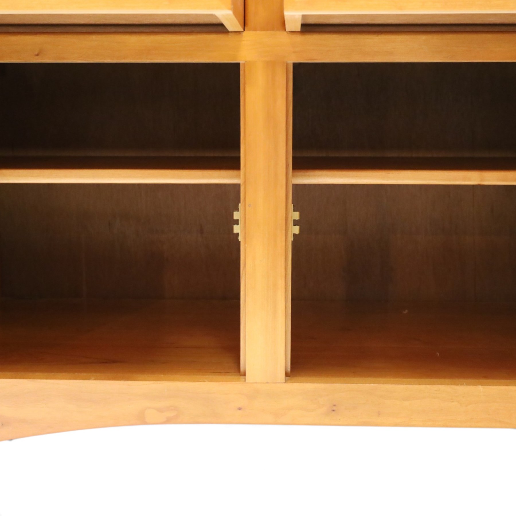 Traditional cherrywood sideboard, rectangular top above three fielded panelled drawers, three cupboard doors with triple panelled doors, brass knobs and hinges, tapered supports