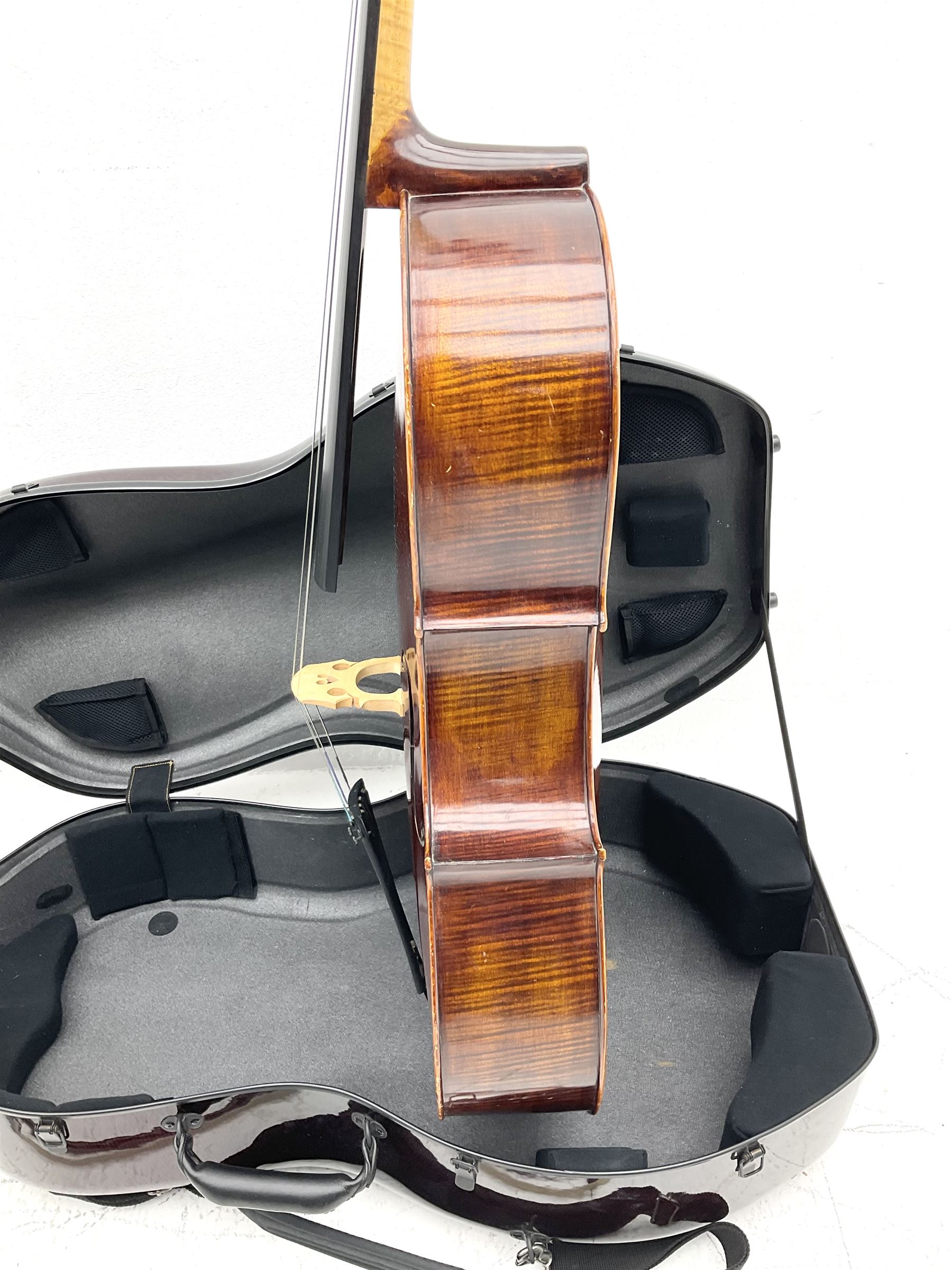 Alfred Stingl by Hofner cello, model AS-360 with 75.5cm two-piece maple back and ribs and spruce top, bears label with serial no.JO411-0706, L122cm; in carbon-fibre carrying case with bow