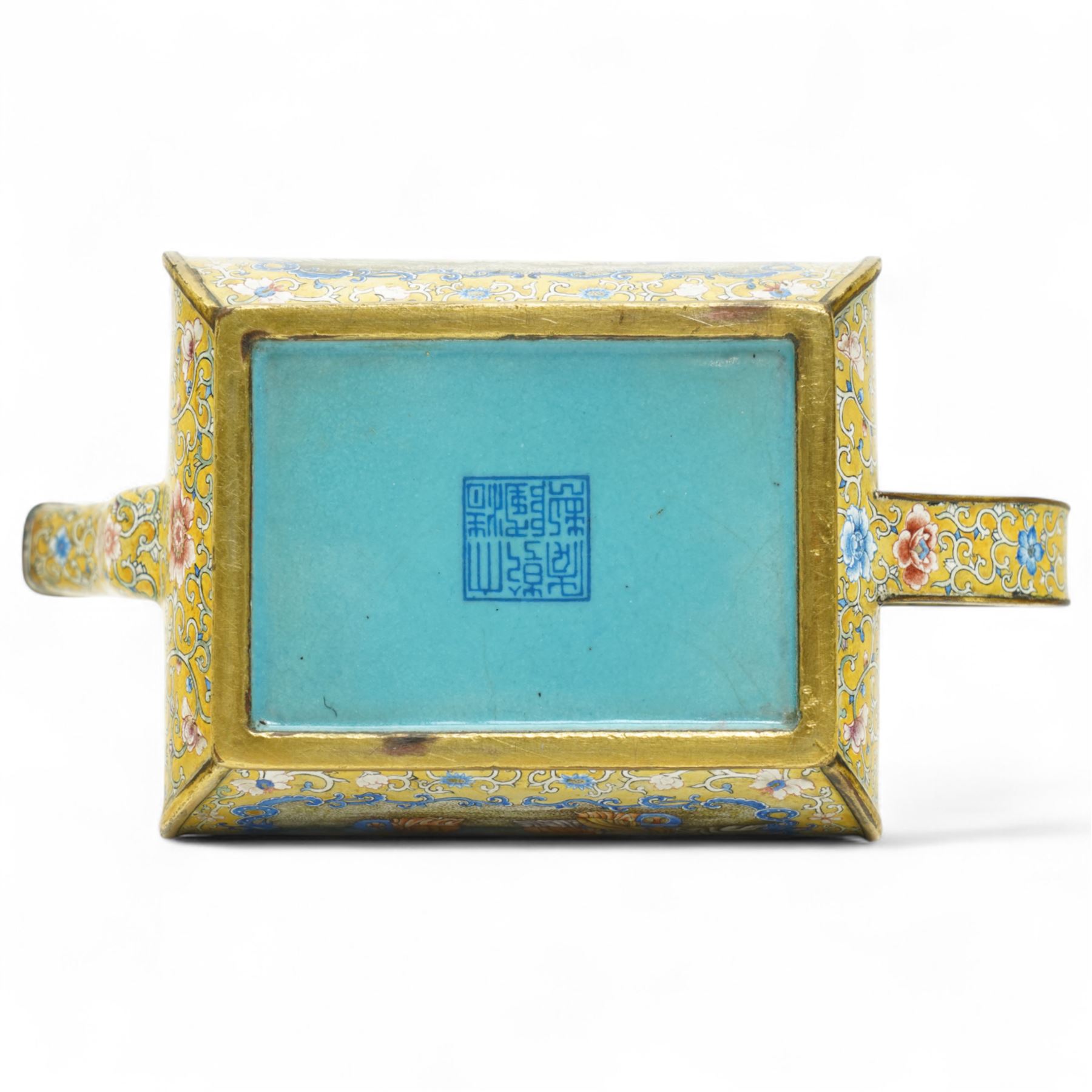 Chinese Qianlong enamel bombé shaped teapot, decorated with scenes of scholars examining a scroll and drinking on a yellow ground with various traditional floral and foliate motifs, the painted scene framed within trailing blue vine border, with Qianlong marks to base L15cm